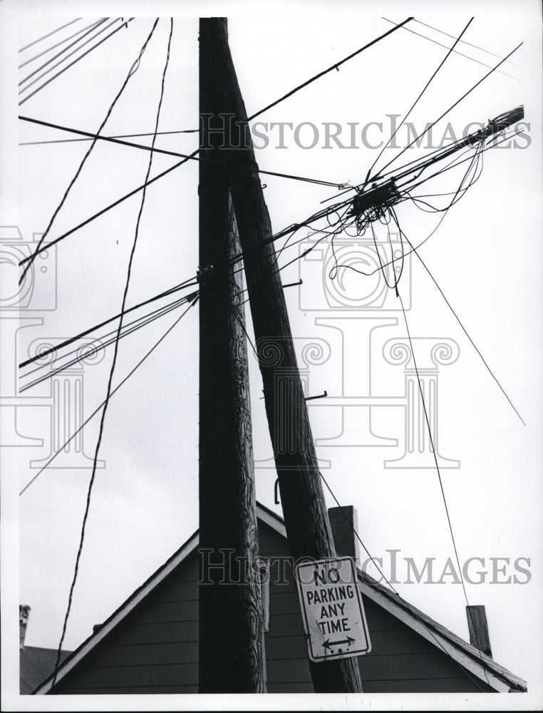 Load image into Gallery viewer, 1969 Press Photo Telephone pole &amp; crossed up wires needs repairs in Cleveland
