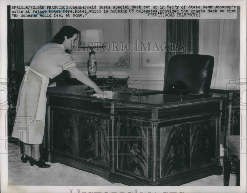 Load image into Gallery viewer, 1951 Press Photo A maid dusts the room of Sec'y of state Dean Acheson's Suite
