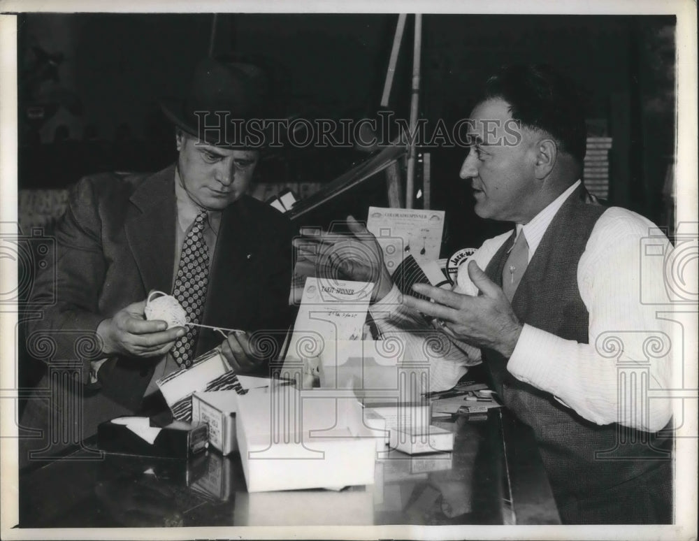 1943 Press Photo Mr. Houser at the Sporting Goods Store