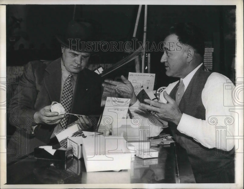 Load image into Gallery viewer, 1943 Press Photo Mr. Houser at the Sporting Goods Store
