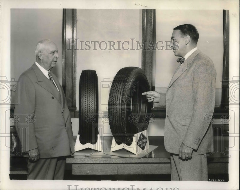 Load image into Gallery viewer, 1947 Press Photo P.W.Litchfield of Goodyear Tire &amp; Rubber compare auto tire.
