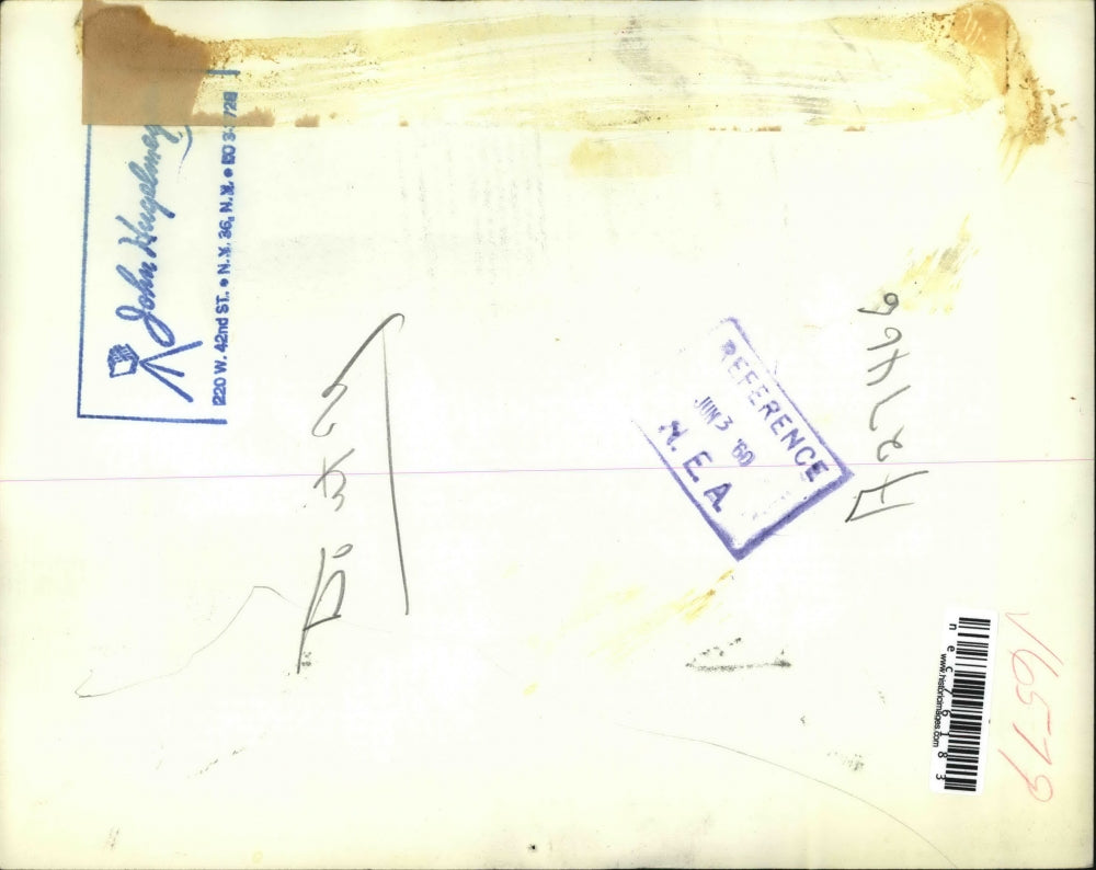 1960 Press Photo An unidentified man using a level to square his work