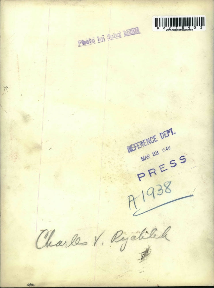 1940 Press Photo Charles V. Ryclilek Enjoying A Cigar