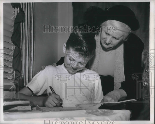 1950 Press Photo Mrs. E.J. Grant helping adopted son