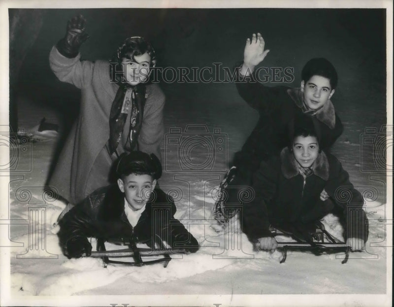 Load image into Gallery viewer, 1954 Press Photo Billy &amp; Jane Birch, John &amp; Nick Soloman sledding
