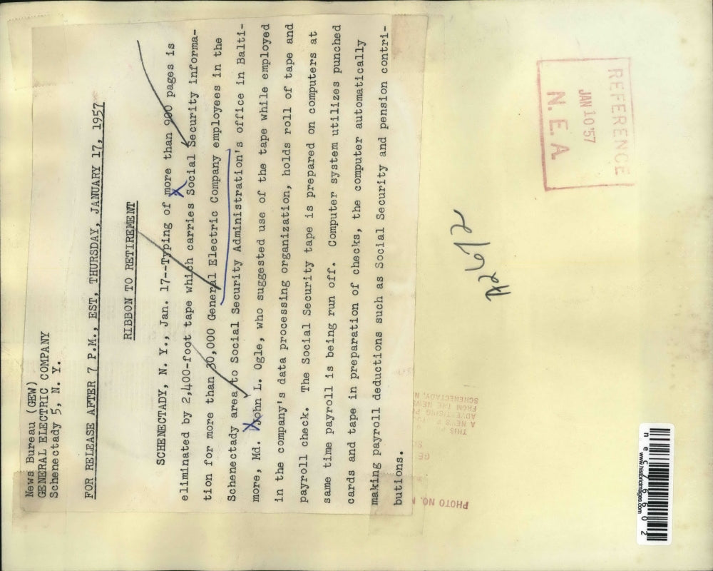 1957 Press Photo John L Ogle holding a roll of Social Security tape