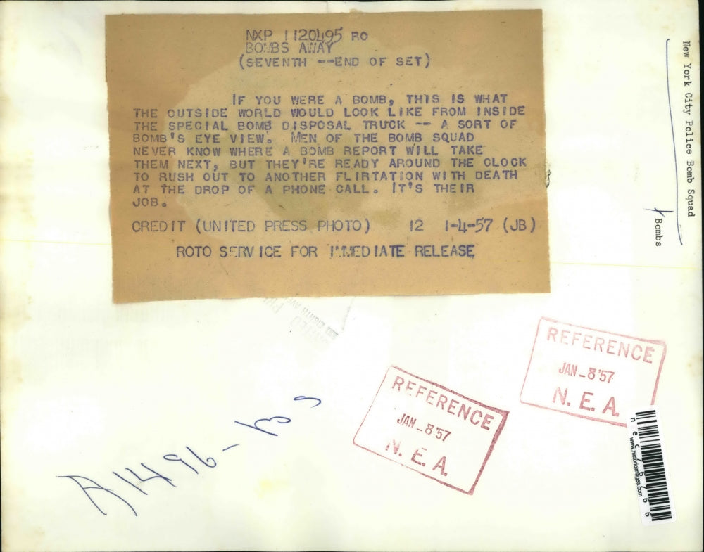 1957 Press Photo Bomb from inside disposal truck