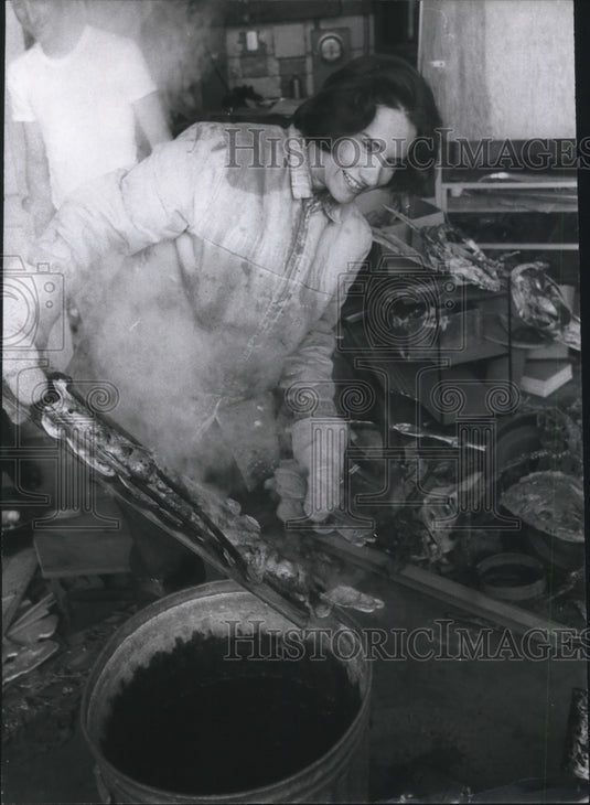 1966 Press Photo Lady deals in metal sculpture