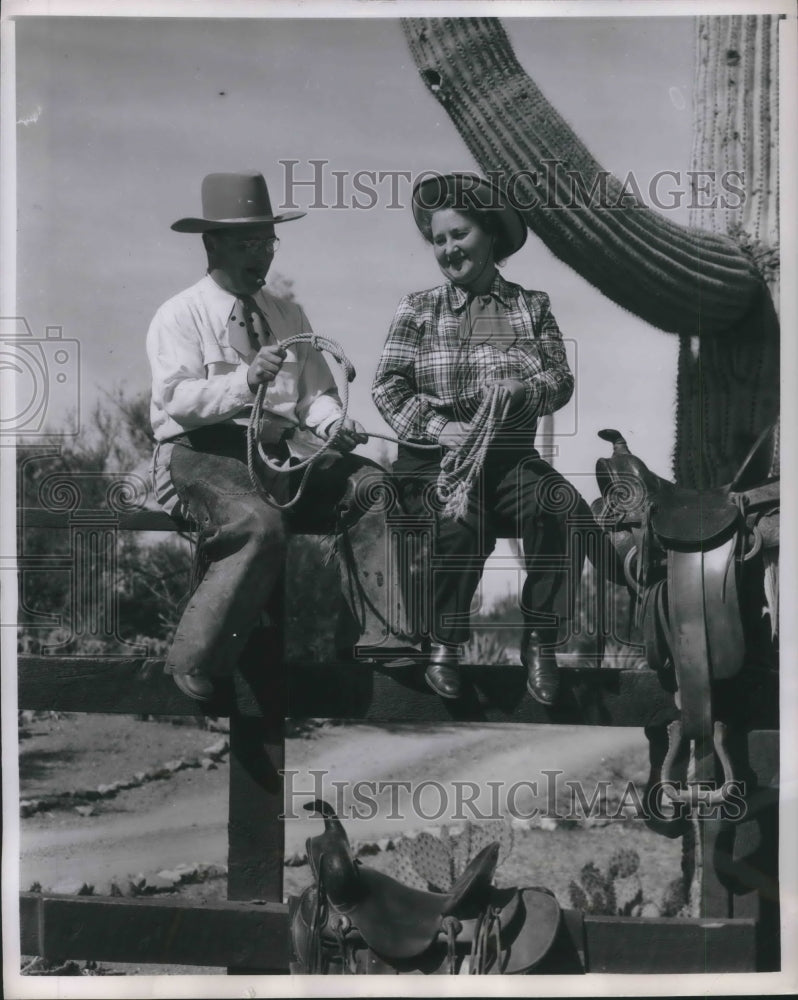Load image into Gallery viewer, 1951 Press Photo Pennsylvania Couple Dressed in Ranch Clothes Sit on Fence
