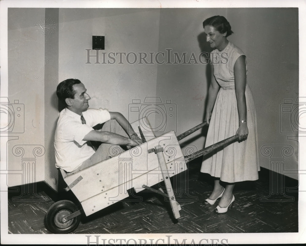 1954 Press Photo Pat Pacto and John Souris in a Wheel Wagon.