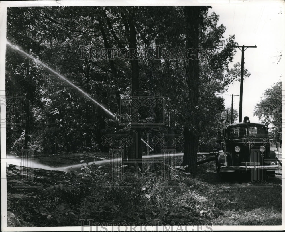 1962 Press Photo False Falls at Mt. Pleasent, Michigan, Fire Truck