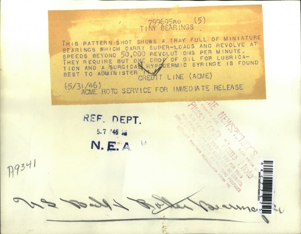 1946 Press Photo Tray full of mini bearings as surgical syringe is used