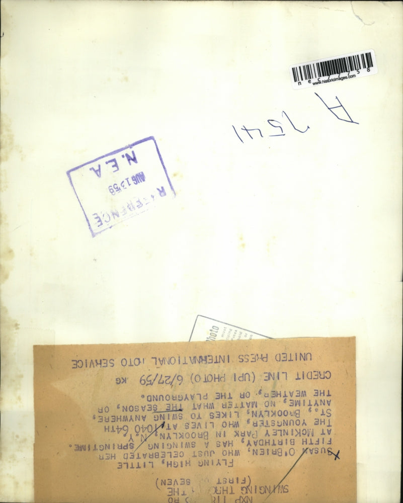 1959 Press Photo Susan O'Brien swings on playground at McKinley Park