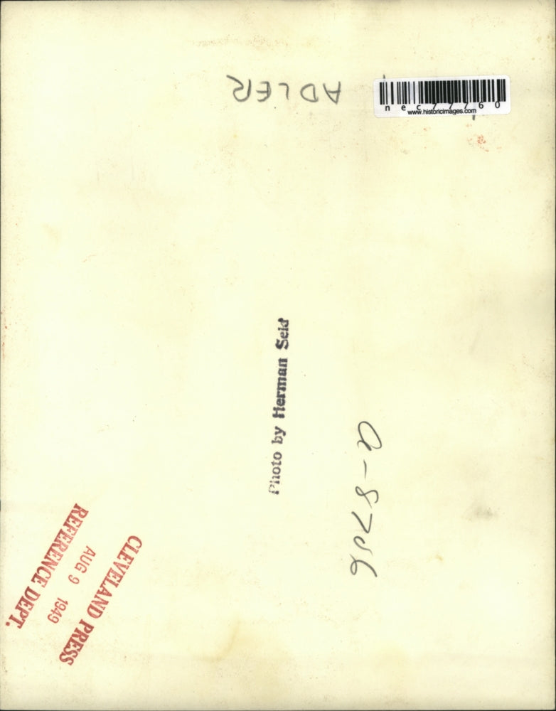 1949 Press Photo Adler Adjusts his tie