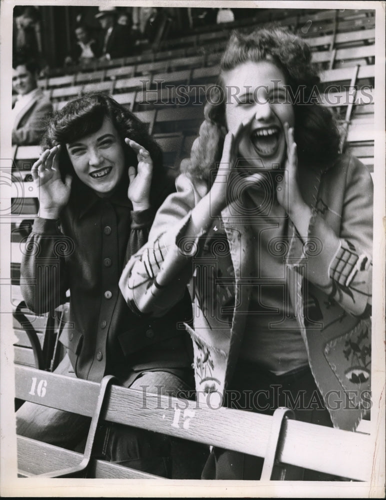 Load image into Gallery viewer, 1951 Press Photo Joy Abrams &amp; Elaine Sacks cheer for contestants at a stadium
