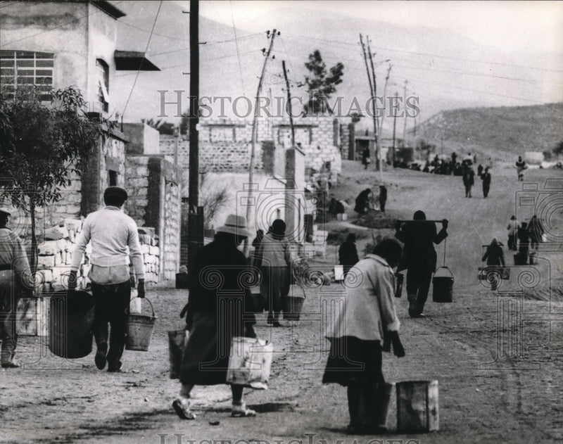 Load image into Gallery viewer, 1965 Press Photo Water Carriers in Peru
