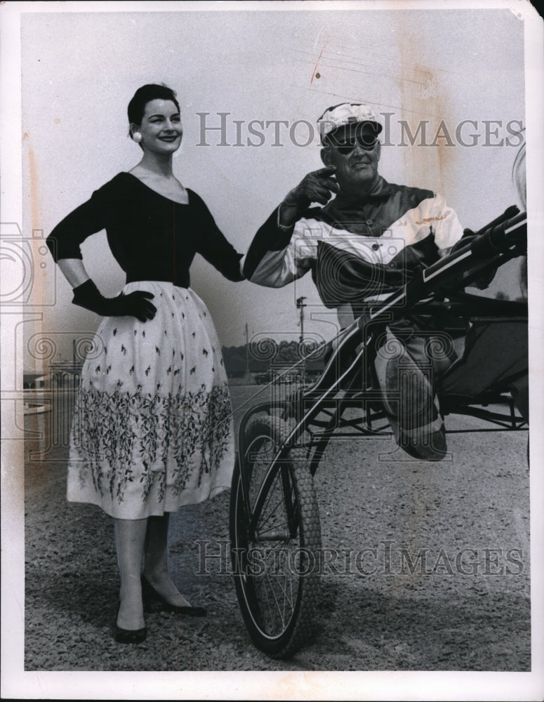 Load image into Gallery viewer, 1956 Press Photo Scoop Neckline blouse and full skirt at the race track
