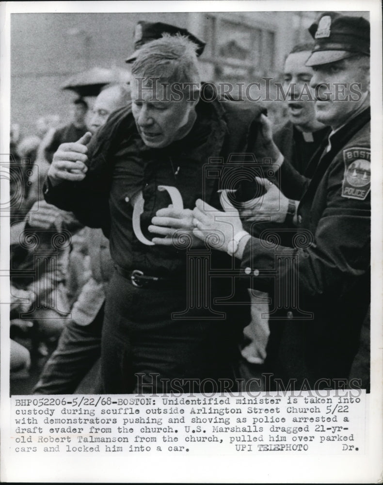 1968 Press Photo Unidentified minister taken out of Arlington Street Church d