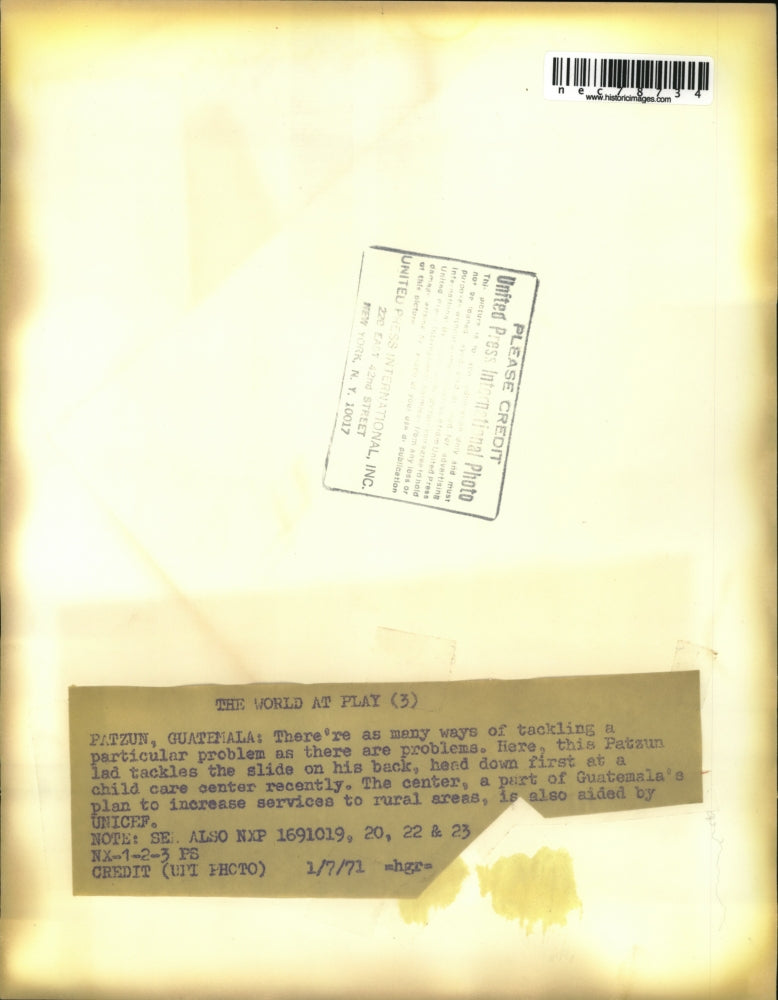 1971 Press Photo Patzun boy sliding down slide