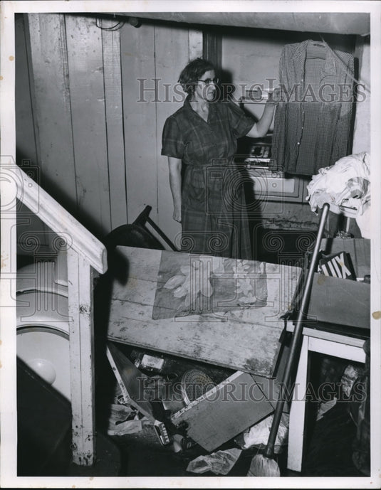 1956 Press Photo Mrs William Schultz at her flooded Cleveland home