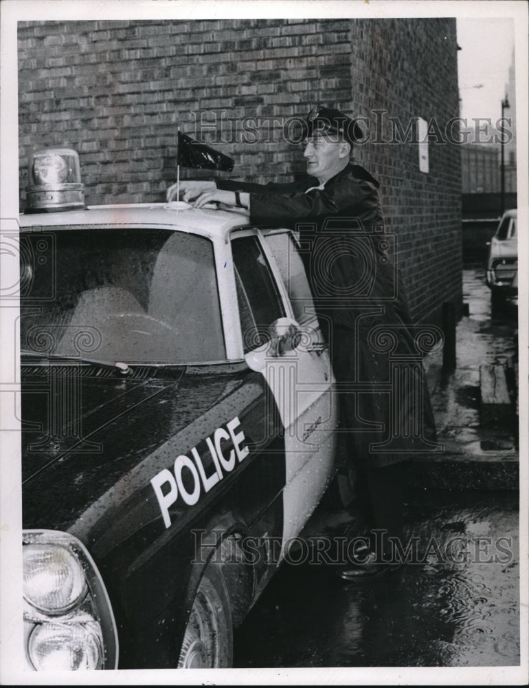 1967 Press Photo Policeman Jack Cornachio & his cruiser