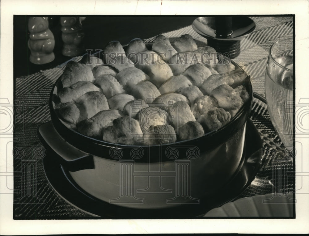 1936 Press Photo Vegetable and Meat cubes seasones with gravy topped with Bread.
