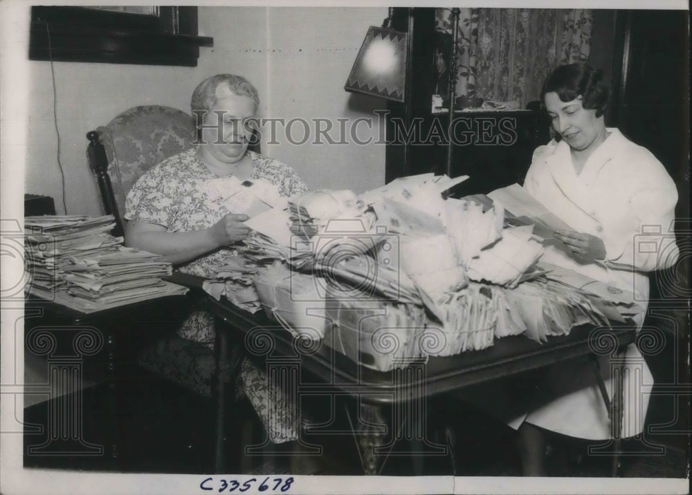 1936 Press Photo Mother of Sleeping Beauty, Patricia Maguire looks over mail