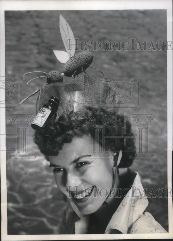 Load image into Gallery viewer, 1950 Press Photo Miami,Fla Barbara Eriksson wears Bumblebee &amp; Insecticide Bonnet
