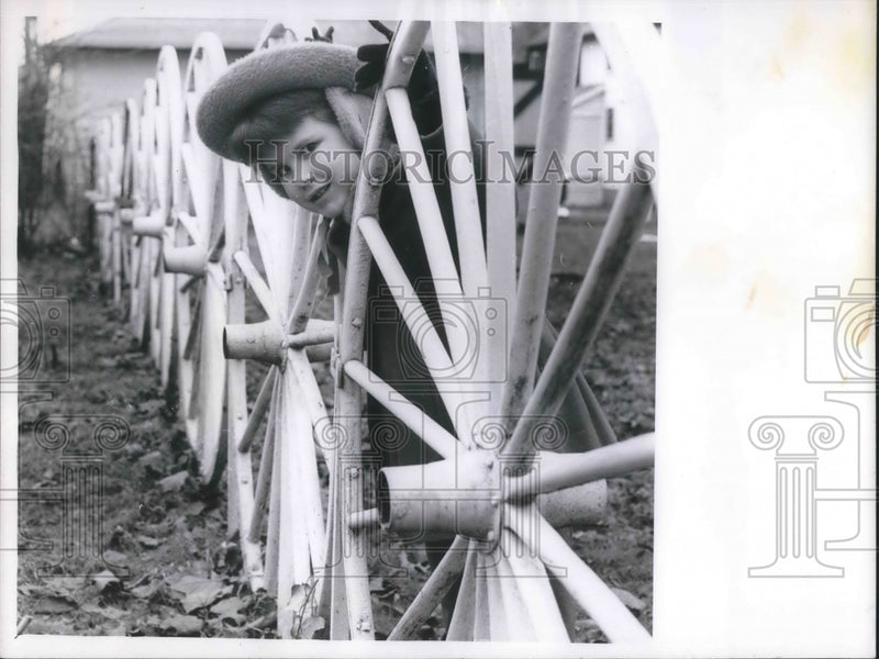 Load image into Gallery viewer, 1962 Press Photo Roseann Fansler at Age 4 Sticks Head Through Wheel Fence
