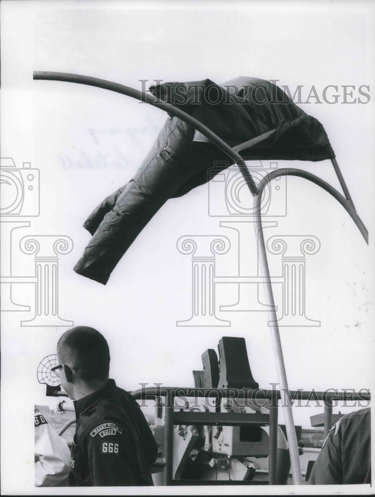 1964 Press Photo flight suit hanging out to dry aboard USS Whitehall