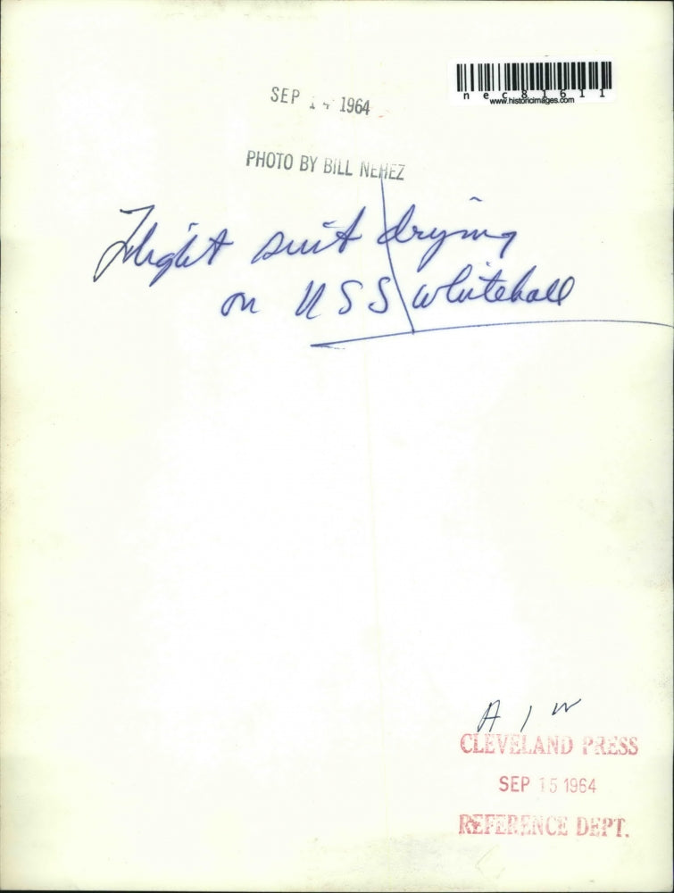 1964 Press Photo flight suit hanging out to dry aboard USS Whitehall