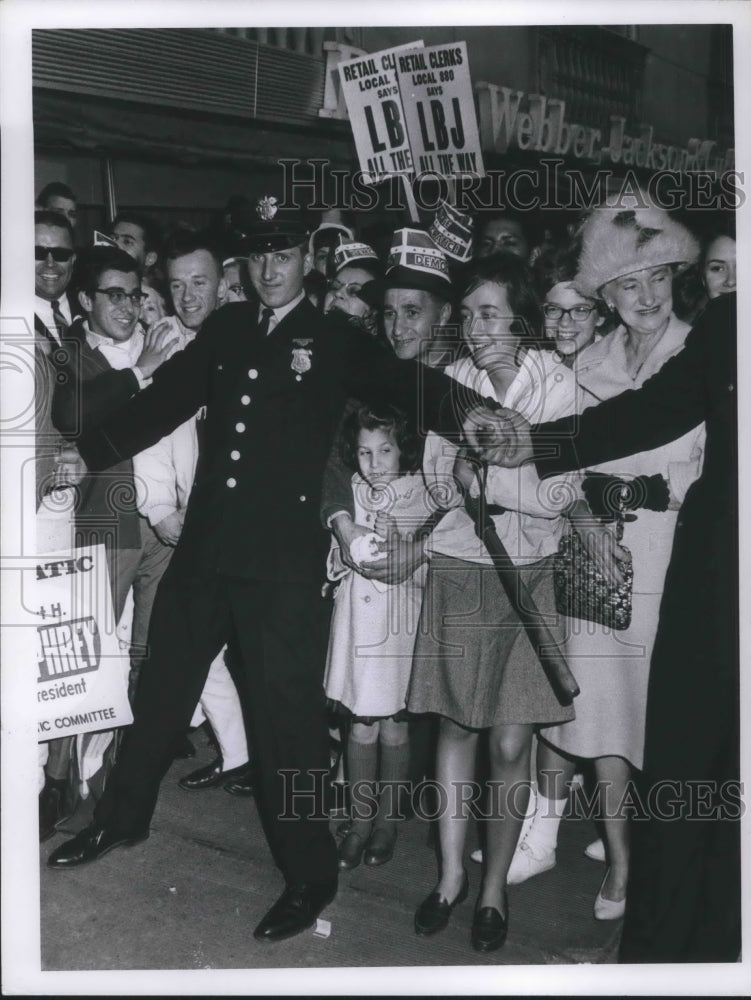 Load image into Gallery viewer, 1964 Press Photo Patrolman Glen Groudle &amp; Janice Anelli age 9, "LBJ All The Way"
