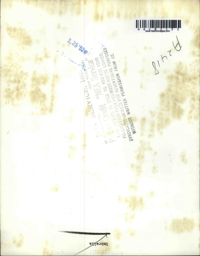 1952 Press Photo A model displaying an umbrella in fashionable colors