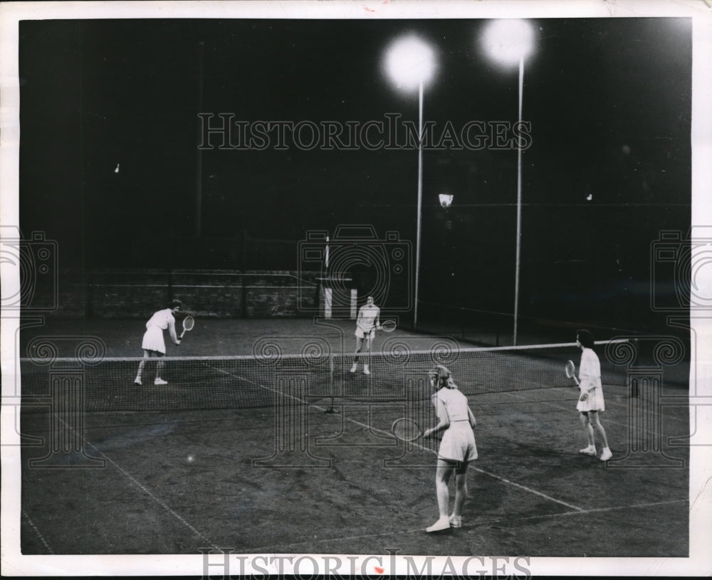 1955 Press Photo Meter Lights allow for night matches at Queens Park Tennis Club