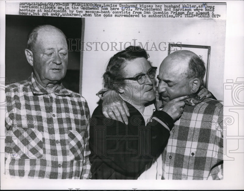 Load image into Gallery viewer, 1959 Press Photo Louise Gschwend kisses hubby Walter as Doug Harrison looks on
