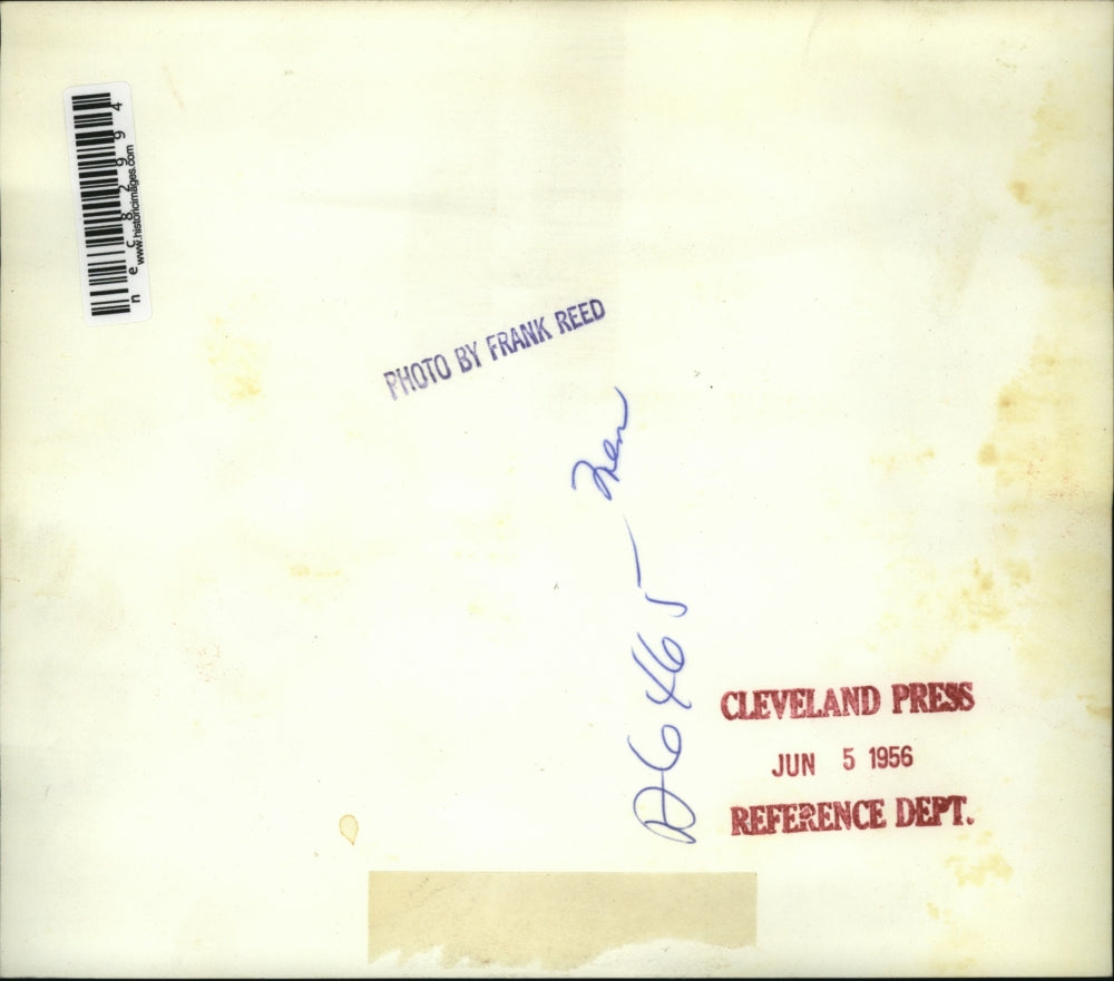 1956 Media Photo Cigarette on left & hat on right of the balance scale