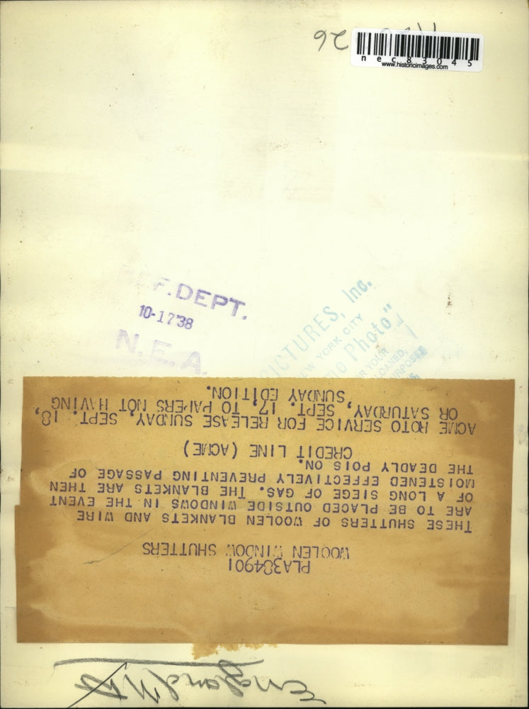 Load image into Gallery viewer, 1938 Press Photo Shutters of Woolen Blankets &amp; Wire for Windows in Gas Siege

