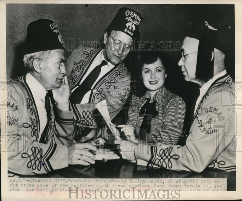 Load image into Gallery viewer, 1948 Press Photo Elaine Salen registering three Shriners from Osman Temple
