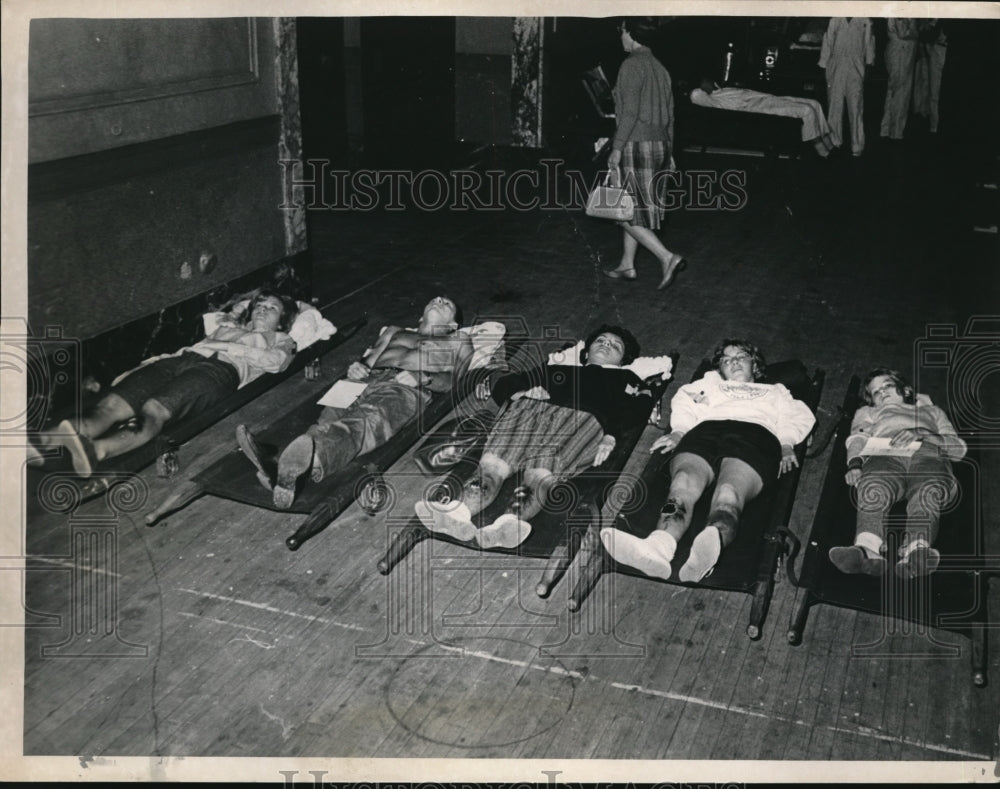 Press Photo Injured on Stretchers Ready to be Put into Ambulances