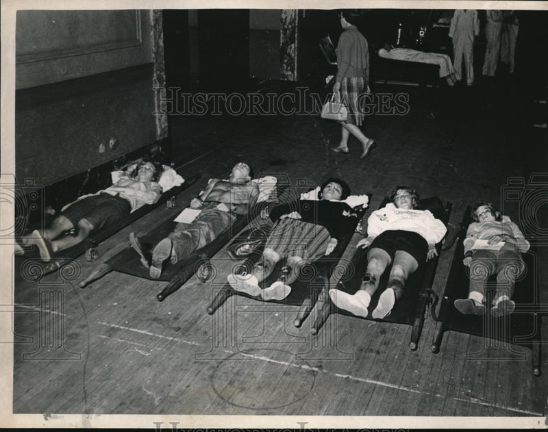 Load image into Gallery viewer, Press Photo Injured on Stretchers Ready to be Put into Ambulances
