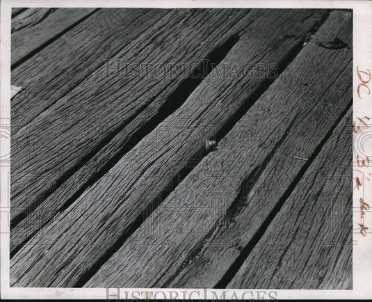 Press Photo Split & rotted boards at a camp need repair & replacement