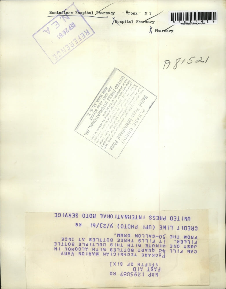 1961 Press Photo Marion Vary of Montefiore Hospital Pharmacy with Bottle Filler