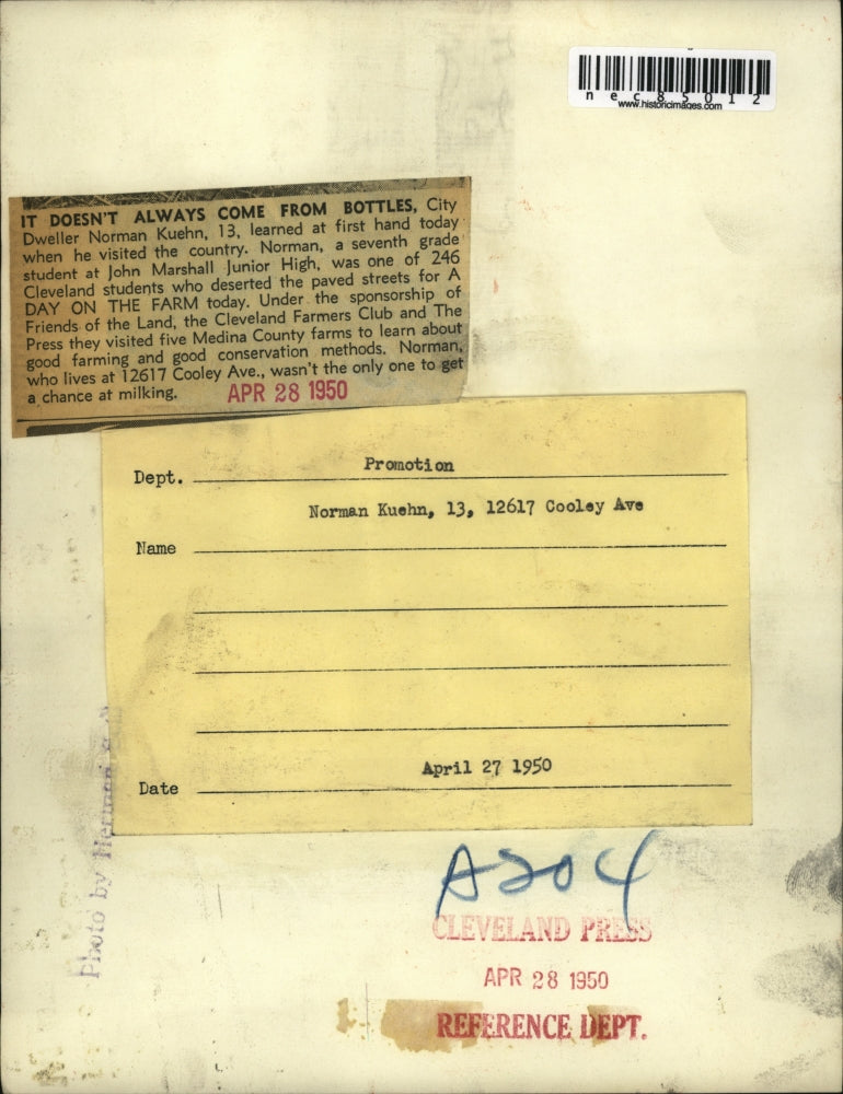 1950 Press Photo Norman Kuehn of John Marshall Junior HIgh School milking a cow