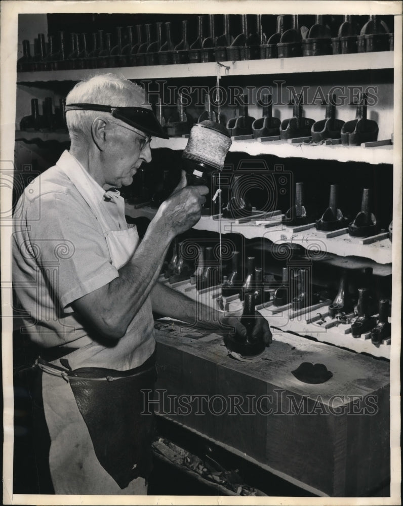 Load image into Gallery viewer, 1948 Press Photo Glover cuts thumb portion for gloves separately
