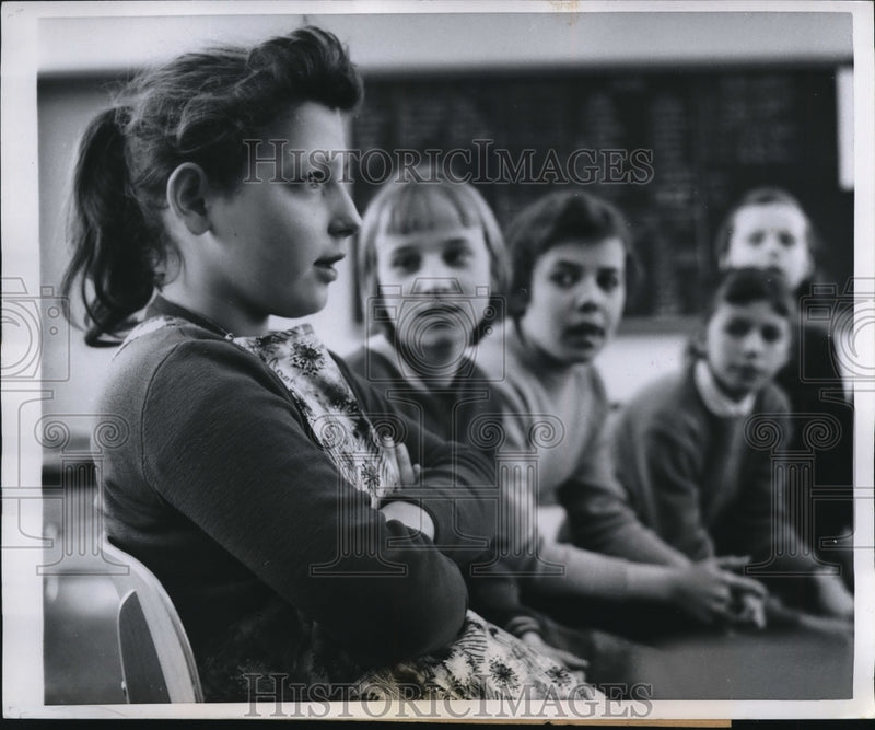 Load image into Gallery viewer, 1958 Press Photo The Words Come From A Long Silent Youngster While Friends Hear
