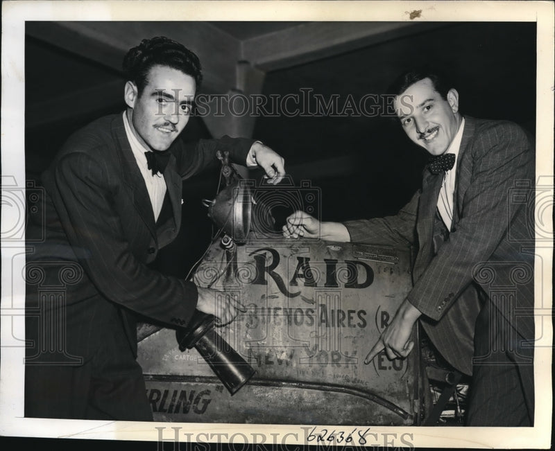 Load image into Gallery viewer, 1941 Press Photo Julian Legia and Julian Rebuffo after 18mile drive in 1925 Ford
