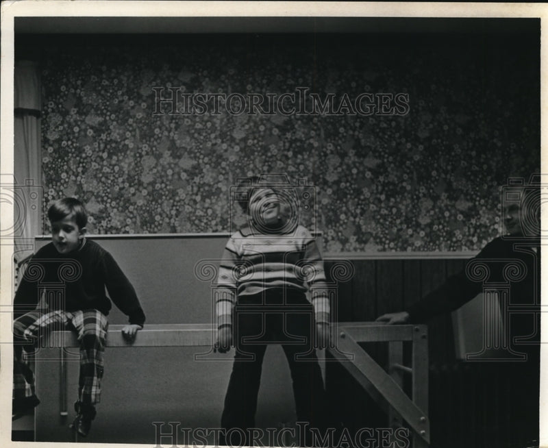 Load image into Gallery viewer, Press Photo Keith and Joey sitting in playroom bench design
