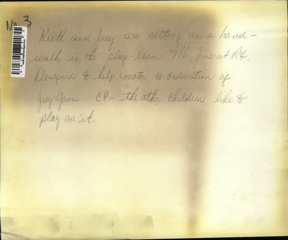 Press Photo Keith and Joey sitting in playroom bench design