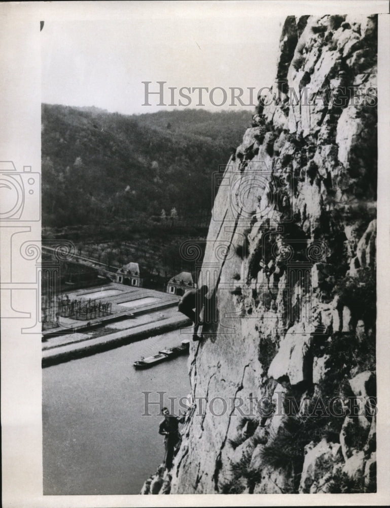 1957 Press Photo L'Legne Rock face climbing, Meus River has claimed 11 lives- Historic Images
