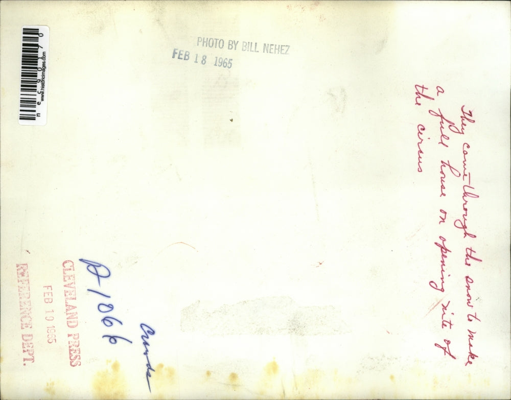 1965 Press Photo Crowd of people walking in snow storm in Cleveland Ohio